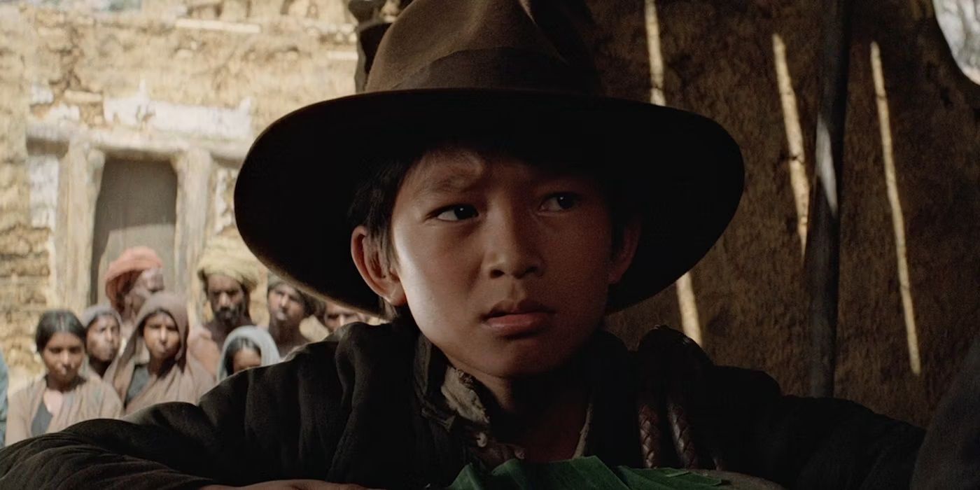Short Round wearing Indy's hat in Temple of Doom-1